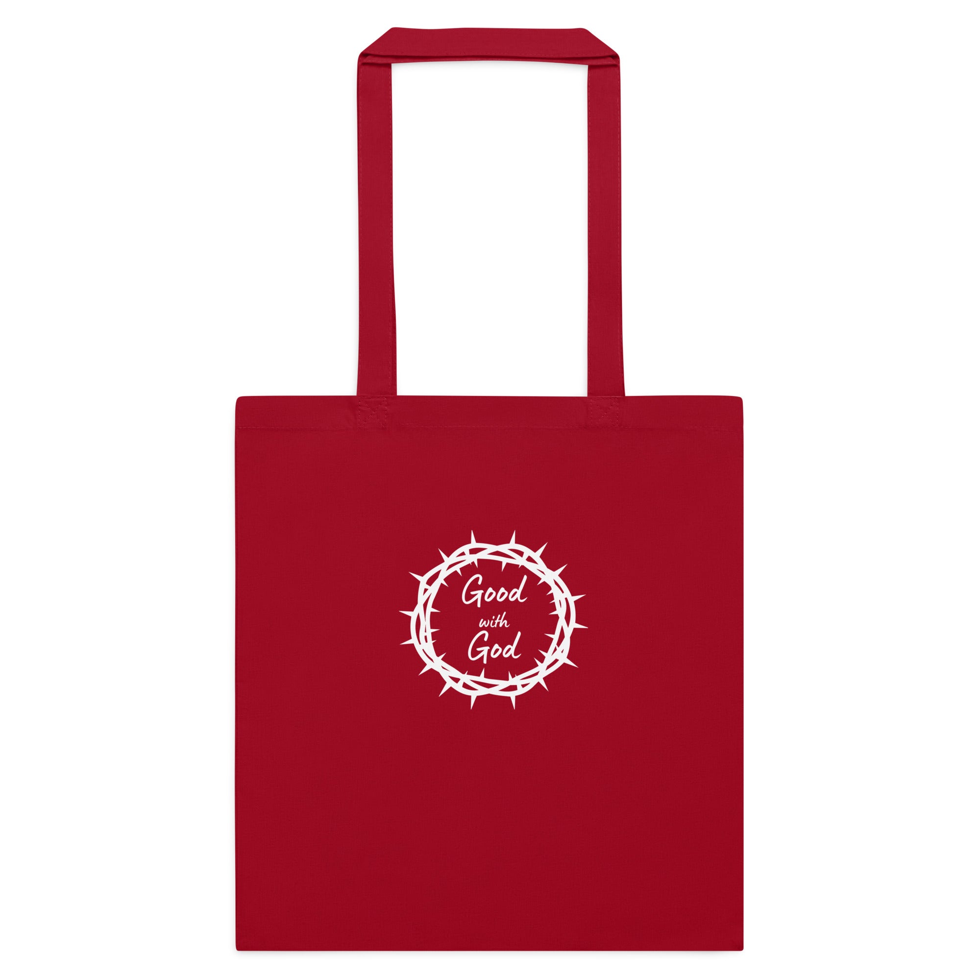 A red canvas tote bag with two top handles, featuring a white circular graphic on the front that reads 'Good with God' inside a crown of thorns design, shown against a plain white background.