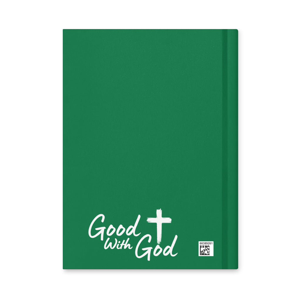 A green hardcover journal with white text reading 'Good with God' and a white cross on the front cover, shown on a plain white background.