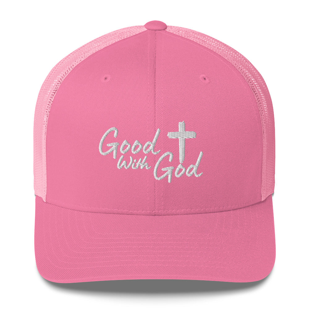 Pink Yupoong 6606 retro trucker hat with white embroidered Good With God Christian logo and cross on structured front panel.