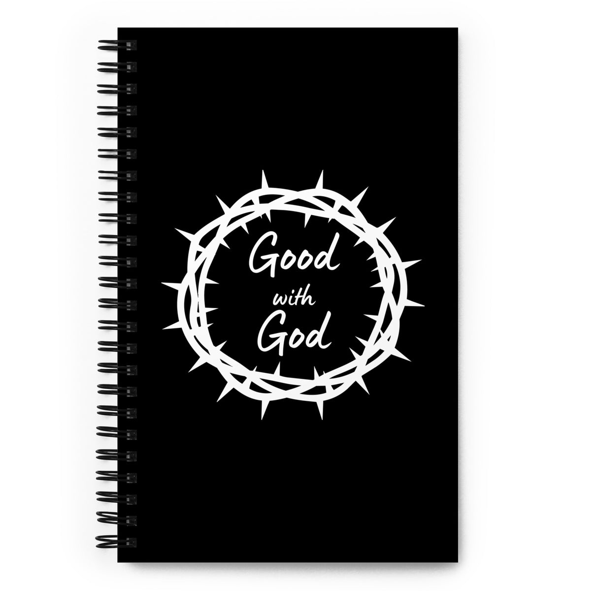 A black spiral-bound notebook with a white graphic of a crown of thorns and the words 'Good with God' on the front cover, shown against a plain white background.