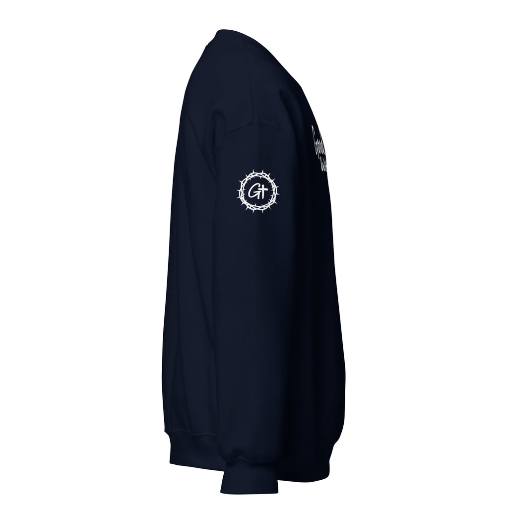 Right sleeve detail of navy Good With God crew neck sweatshirt featuring printed white crown of thorns logo with cross.