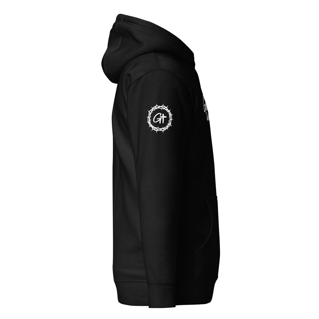 Right sleeve detail of black Good With God premium pullover hoodie featuring a white crown of thorns logo enclosing a cross graphic.
